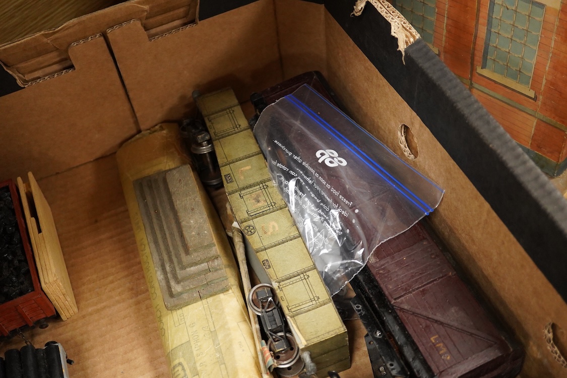 Eleven 0 gauge railway wooden freight wagons, wooden bodies and most possibly kit built using Bonds etc. parts, including a Leeds bogie mineral wagon, together with two kit or scratchbuilt wooden London Underground stati